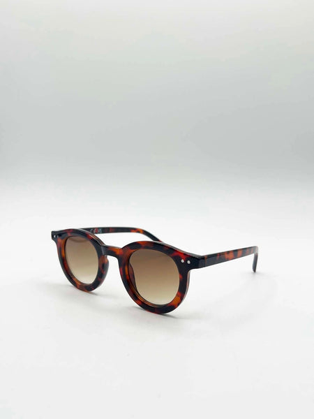 Bold circle tortoiseshell sunglasses