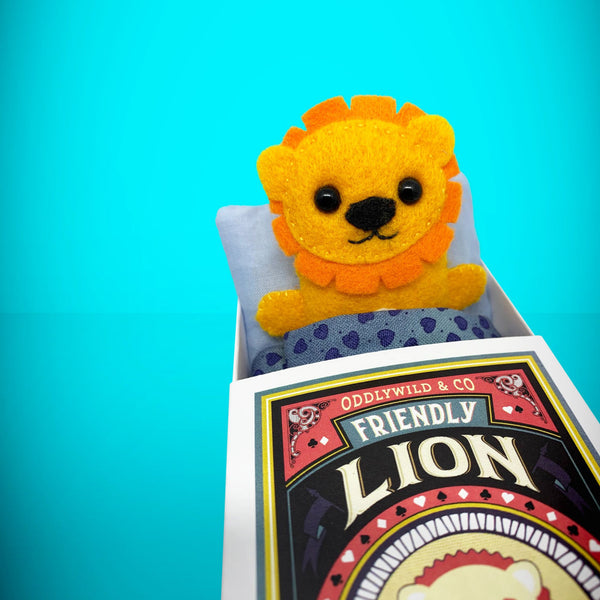 Felt lion in a box