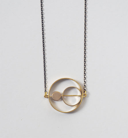 Brass rings within rings necklace