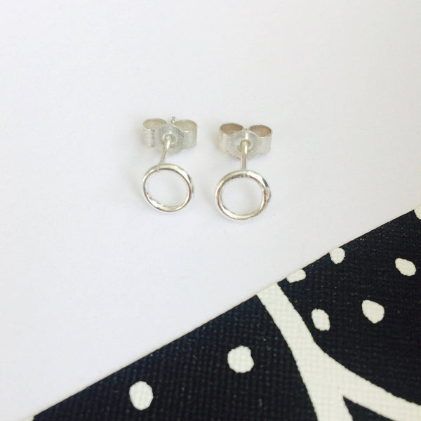 Tiny silver circle studs