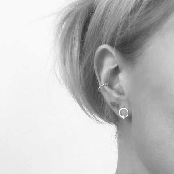 Silver circle with diamond cut nugget stud earring