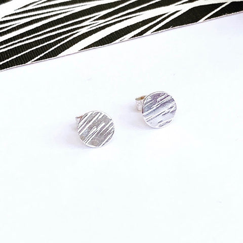 Textured silver disc stud earring