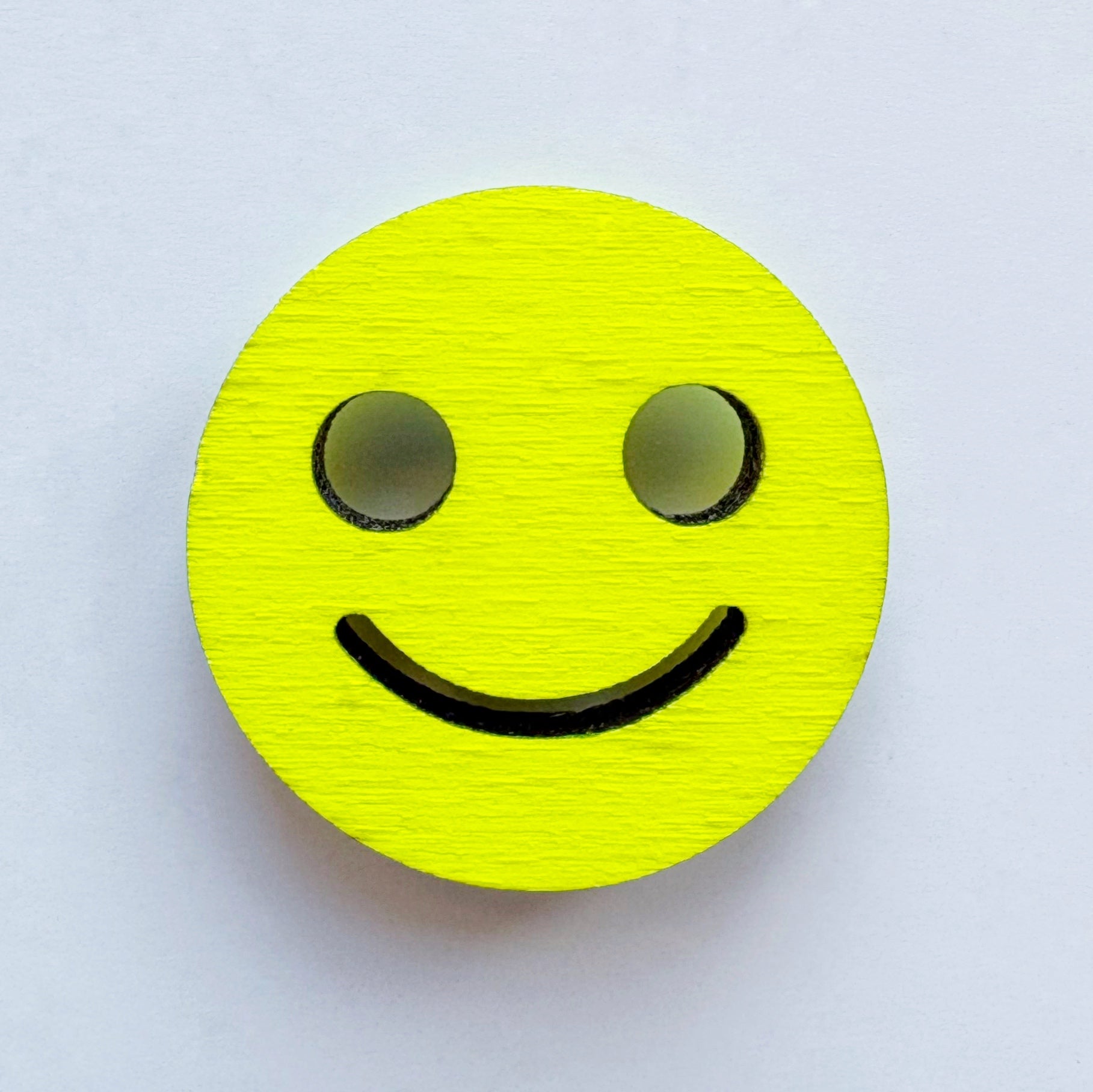 Smiley yellow pin brooch
