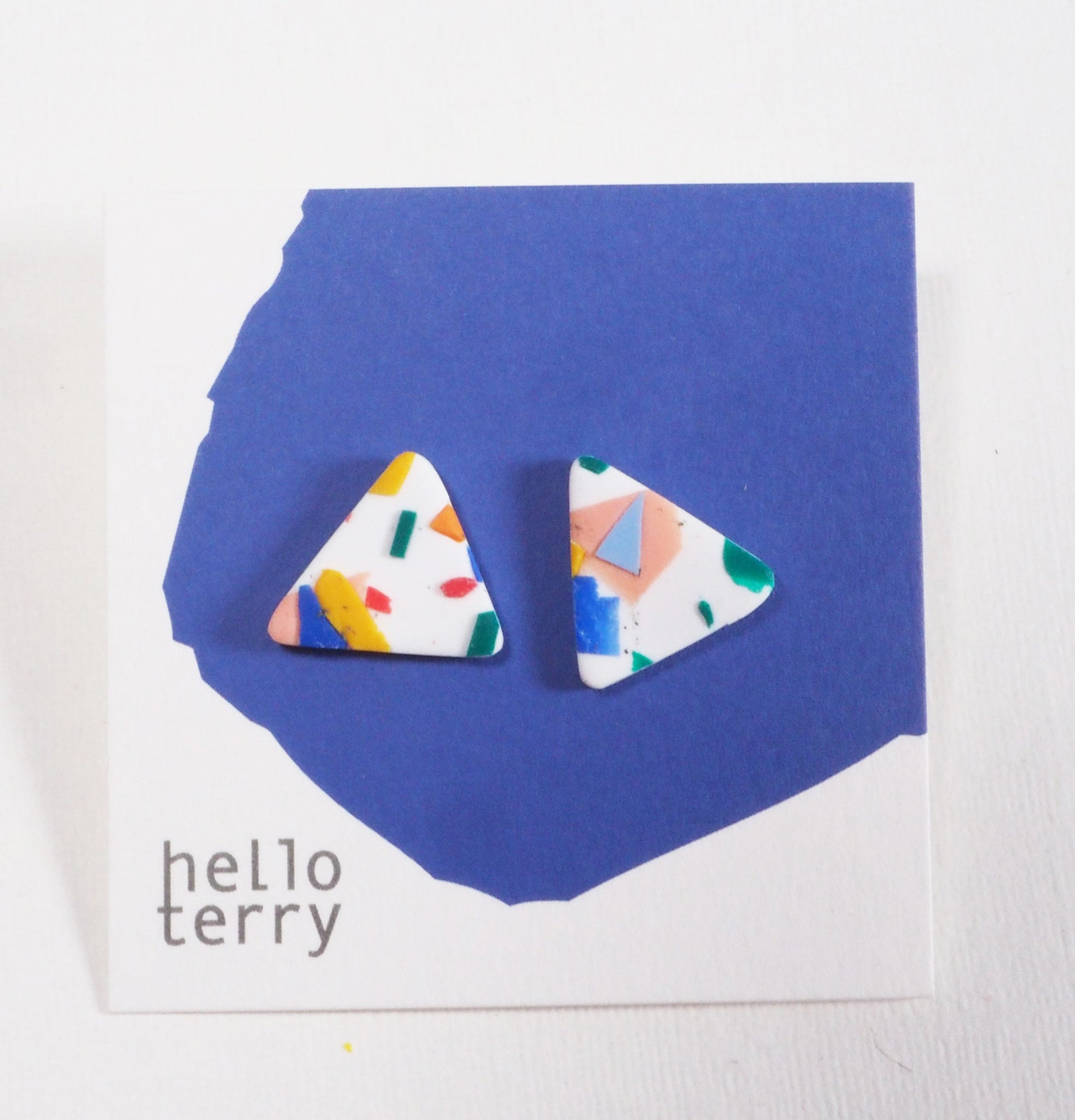 Waste Not white triangle stud earrings