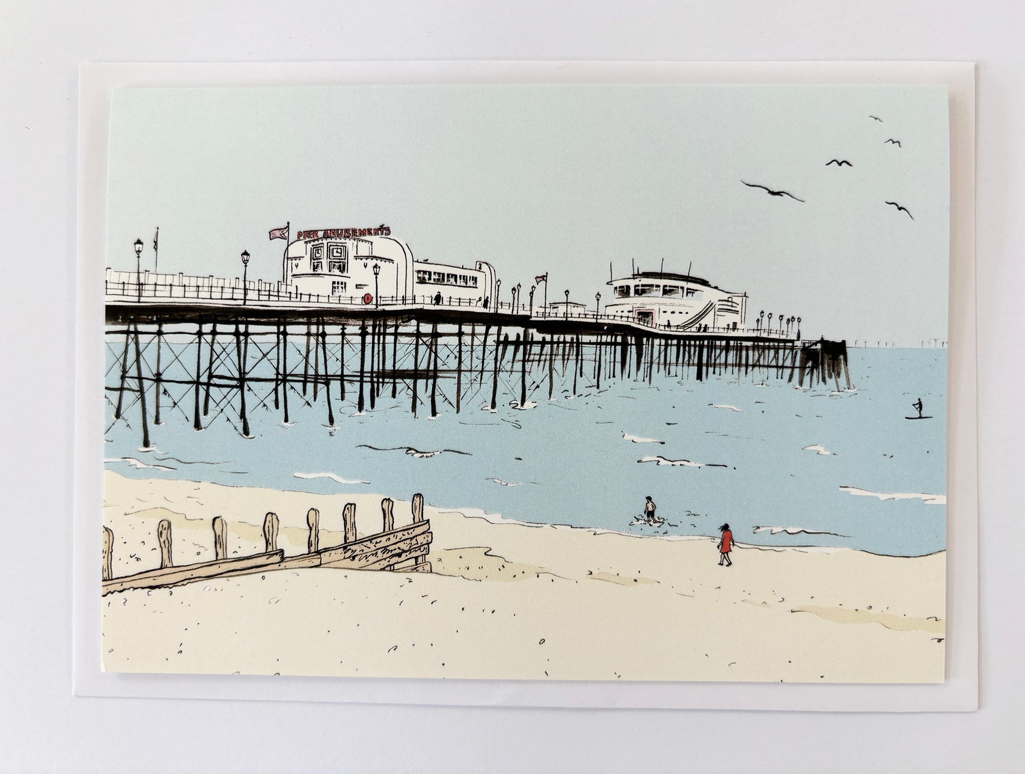 Paddle By The Pier greetings card