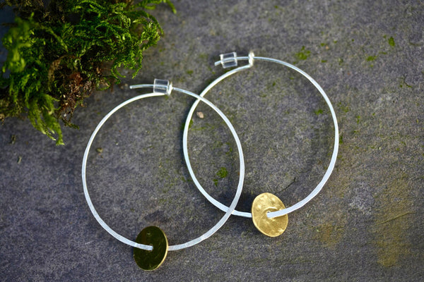 Large silver hoops with brass disc