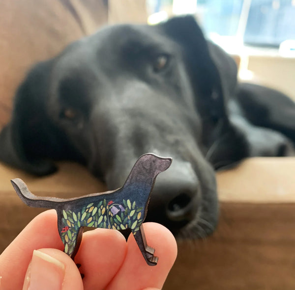 Dog pin badge