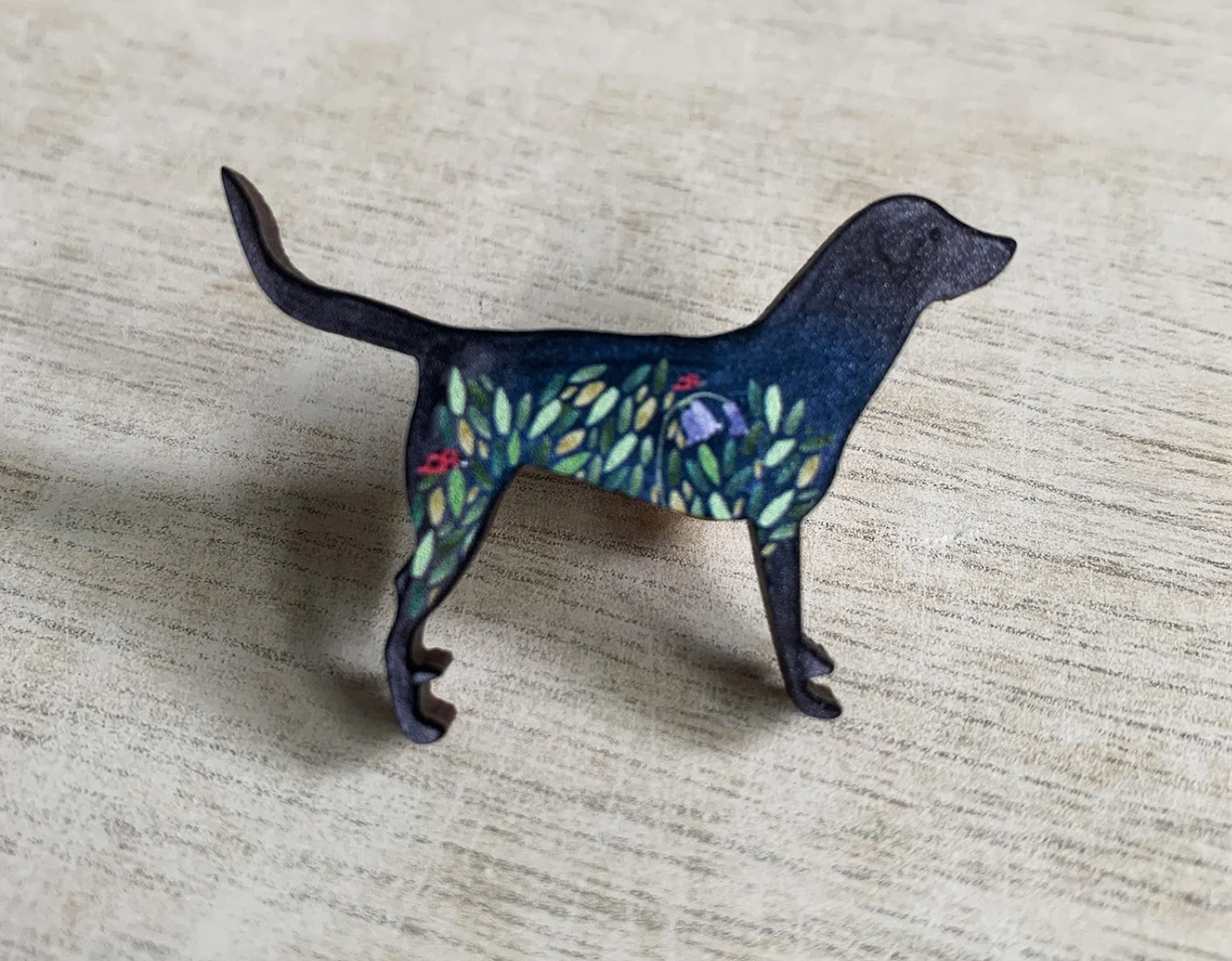 Dog pin badge