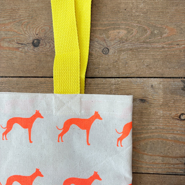 Neon orange whippet hand screen printed tote bag