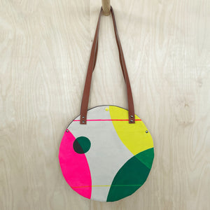 Small green, yellow & pink circular bag
