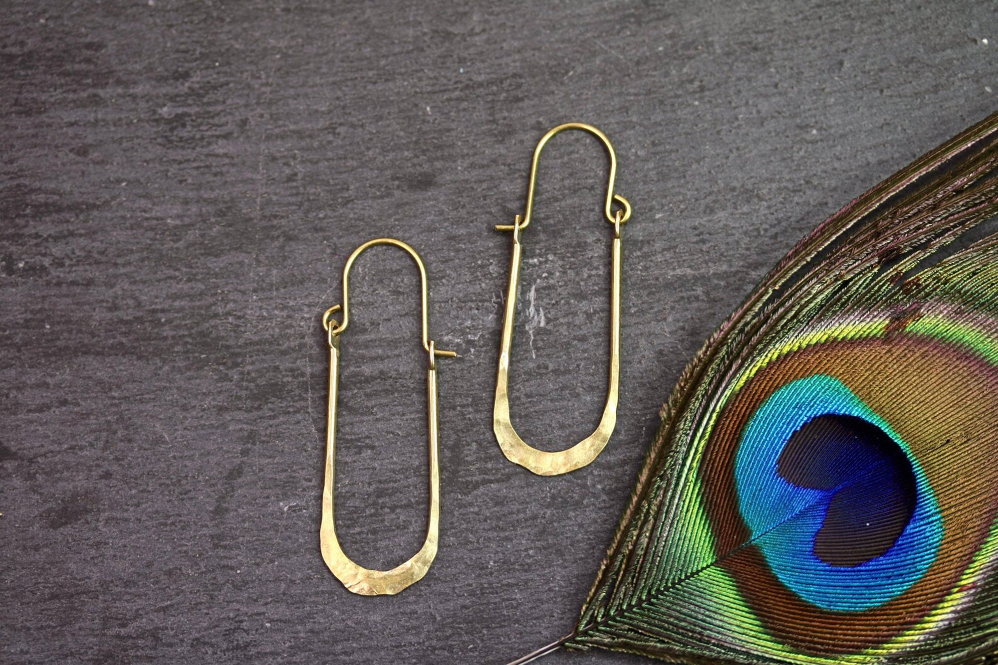 Hammered brass arc hoop earrings