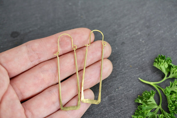 Hammered brass oblong hoop earrings