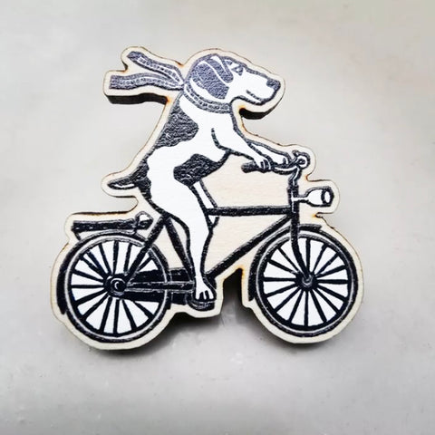 Dog on a bike pin