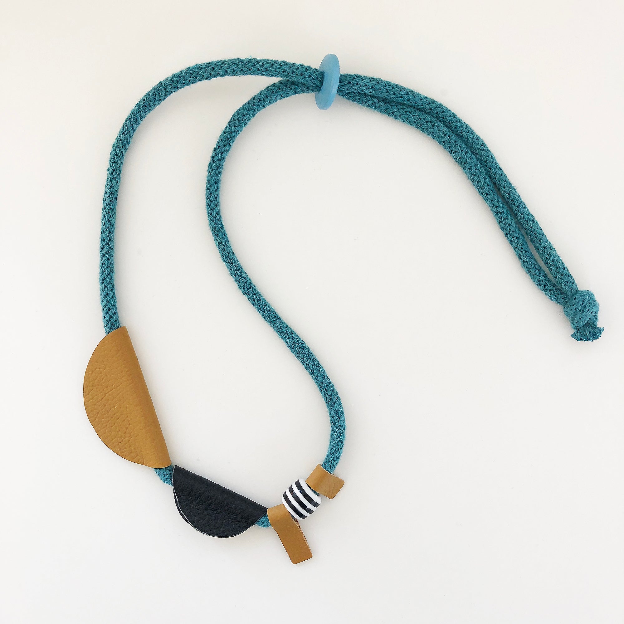 Black & mustard leather shapes necklace