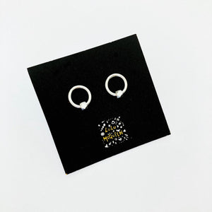 Silver circle with diamond cut nugget stud earring