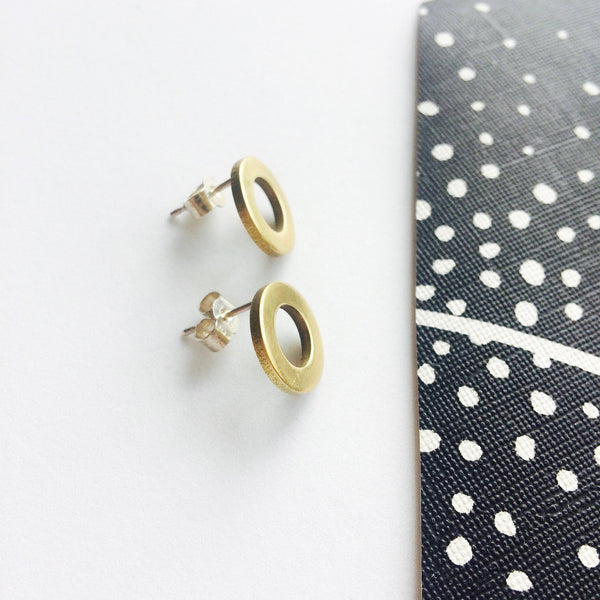 Circular brass stud earrings