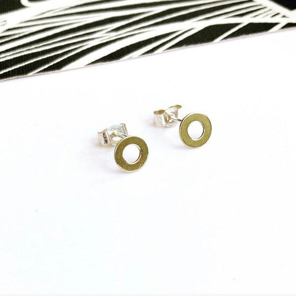 Tiny circular brass stud earrings
