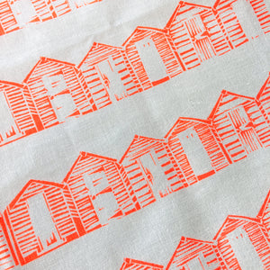 Beach Huts tea towel