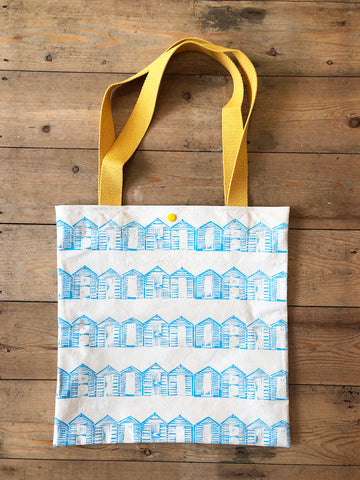 Blue beach huts hand screen printed tote bag