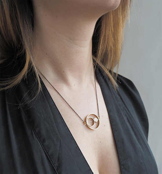 Brass rings within rings necklace