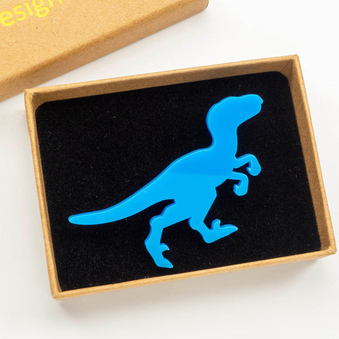 Blue raptor dinosaur brooch