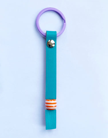 Teal painted & orange stripe bead keyring