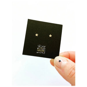 Tiny star stud earrings gold effect