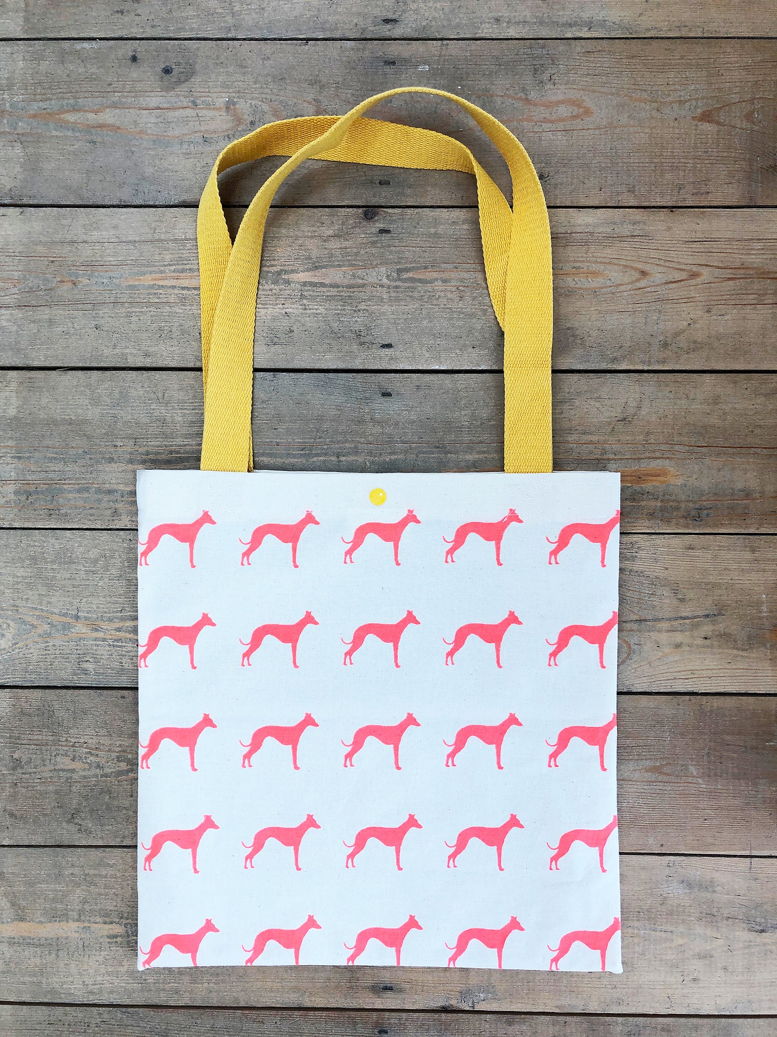 Neon orange whippet hand screen printed tote bag
